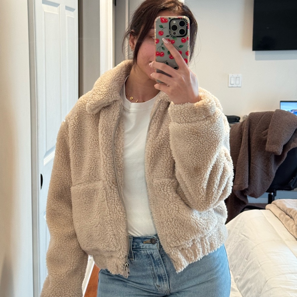 Urban Outfitters cream cropped sherpa jacket.